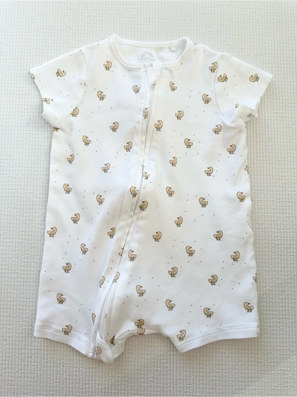 A set of 3 shortie rompers
